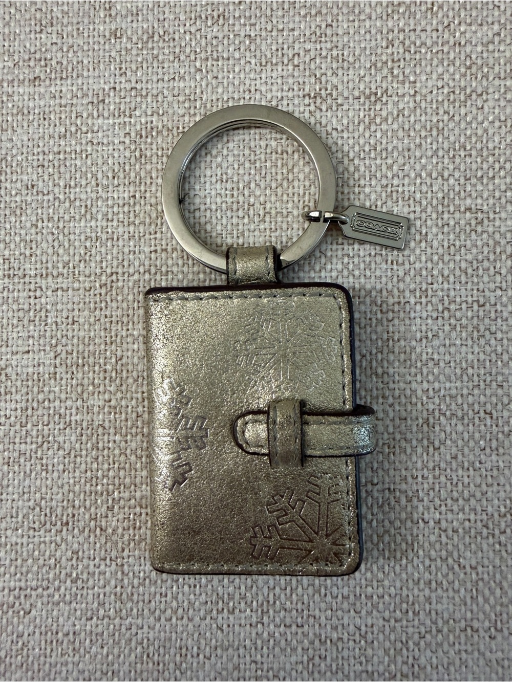 Coach Silver Metallic Snowflake Photo Keychain